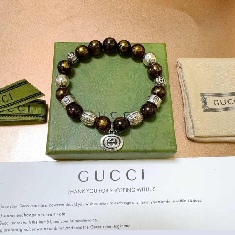 G*u*i bracelets
